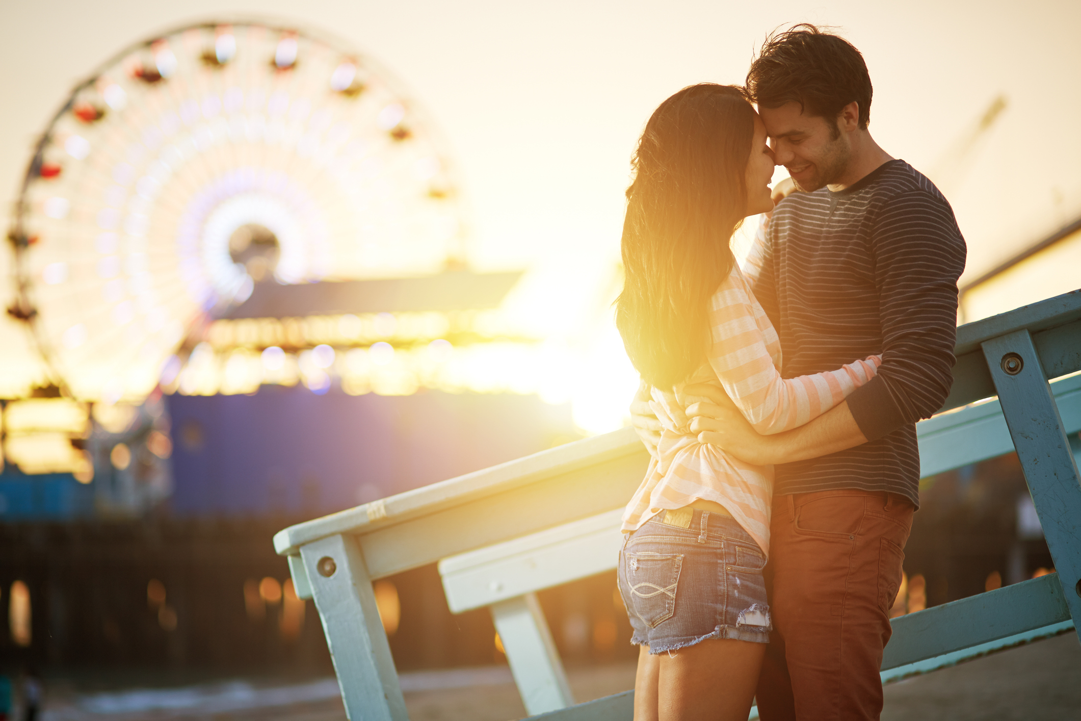 romantic couple embracing  at sunset