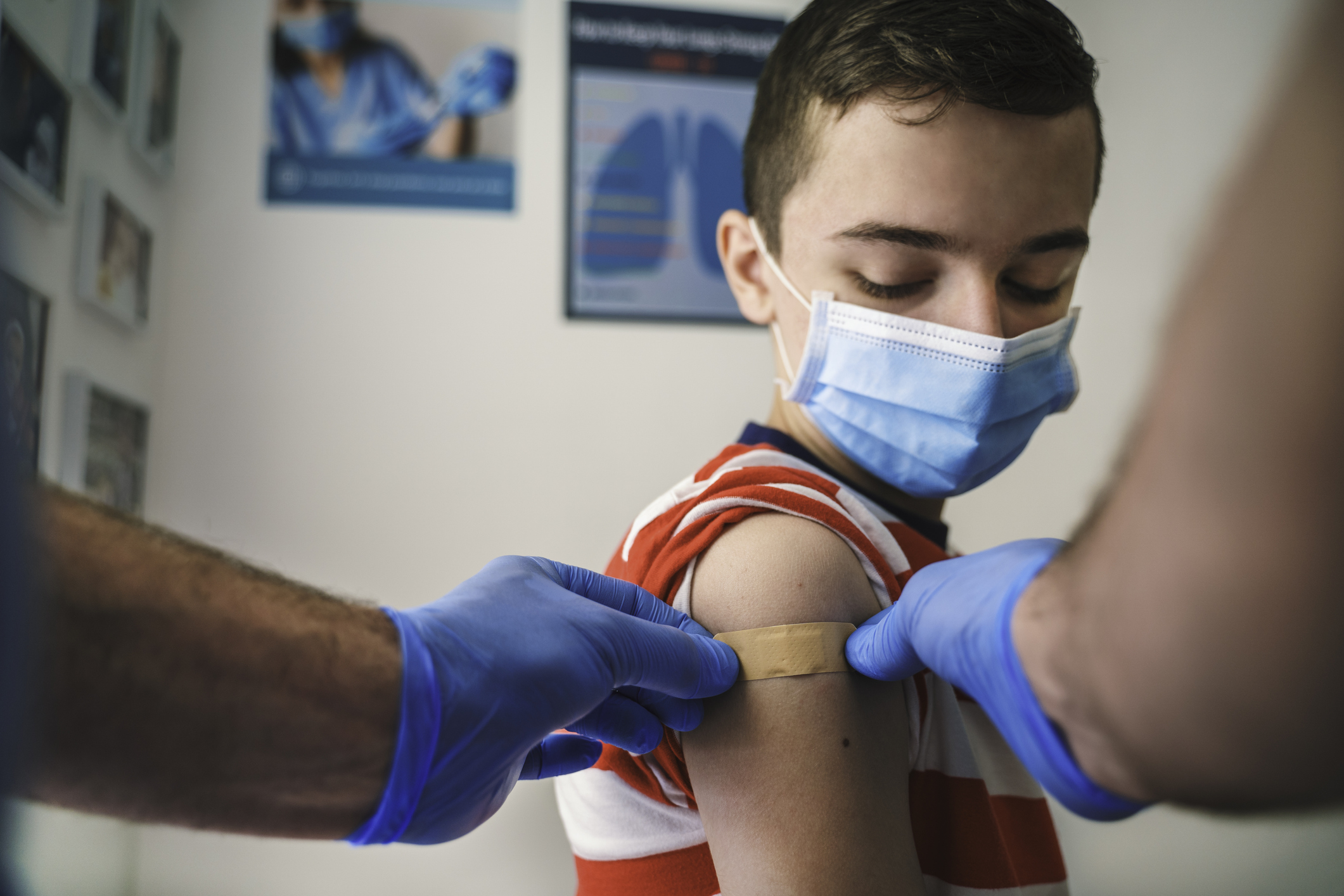 Patient Getting Vaccinated against COVID-19. Child, teenage boy vaccination. Coronavirus epidemic. Copy space.