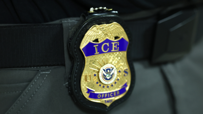 The badge of an Immigration and Customs Enforcement (ICE) agent