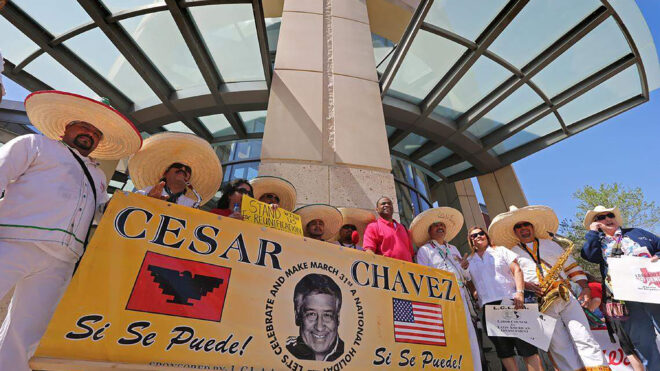 In this 2014 photo, members of the Banda Show Paraiso pose for photos outside the TCC Trinity River Campus after a march with about 1,000 participants through downtown Fort Worth to honor the birthday of American labor and civil rights activist Cesar Chavez.